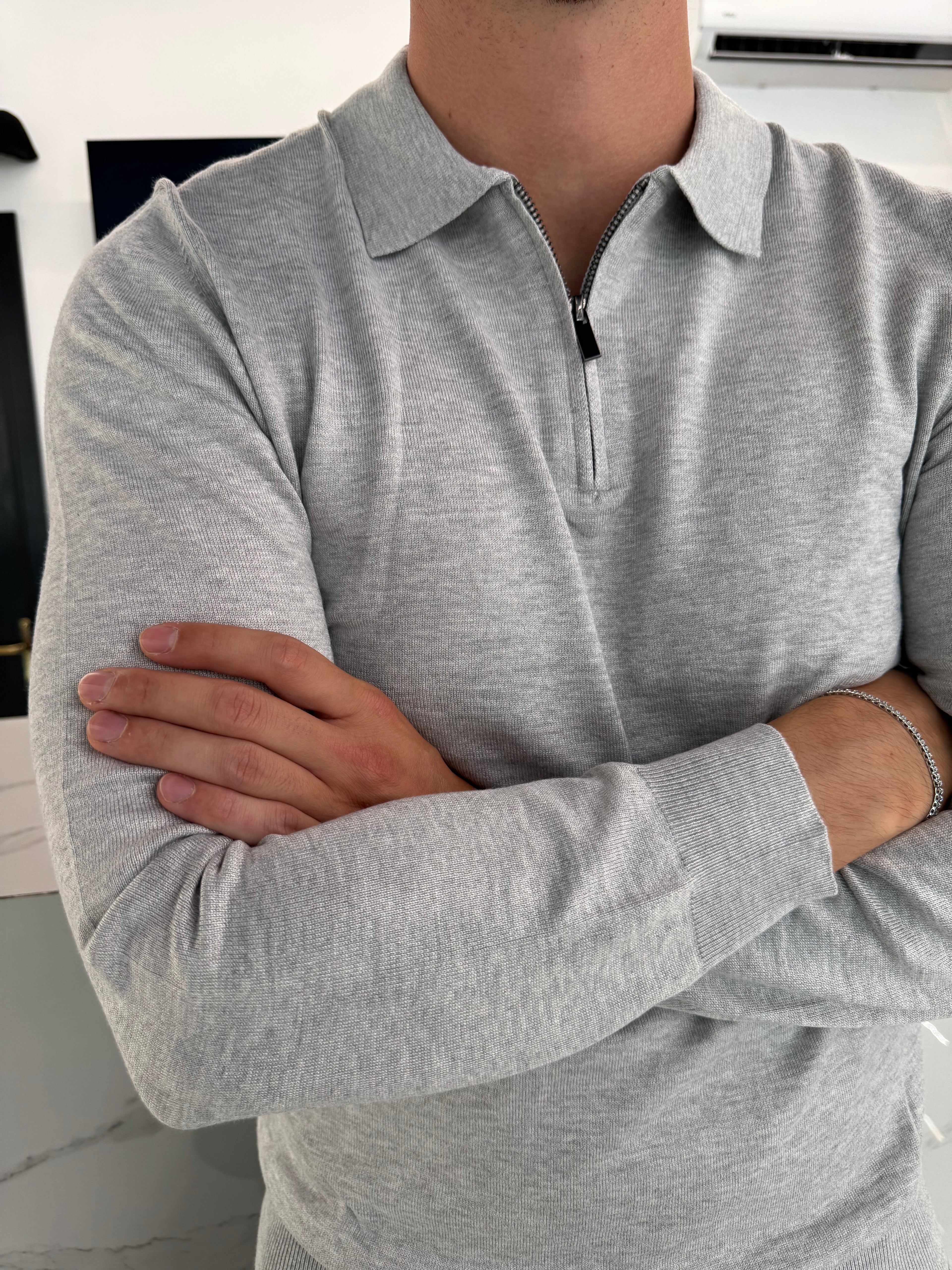 Polo maniche lunghe con zyp grigia