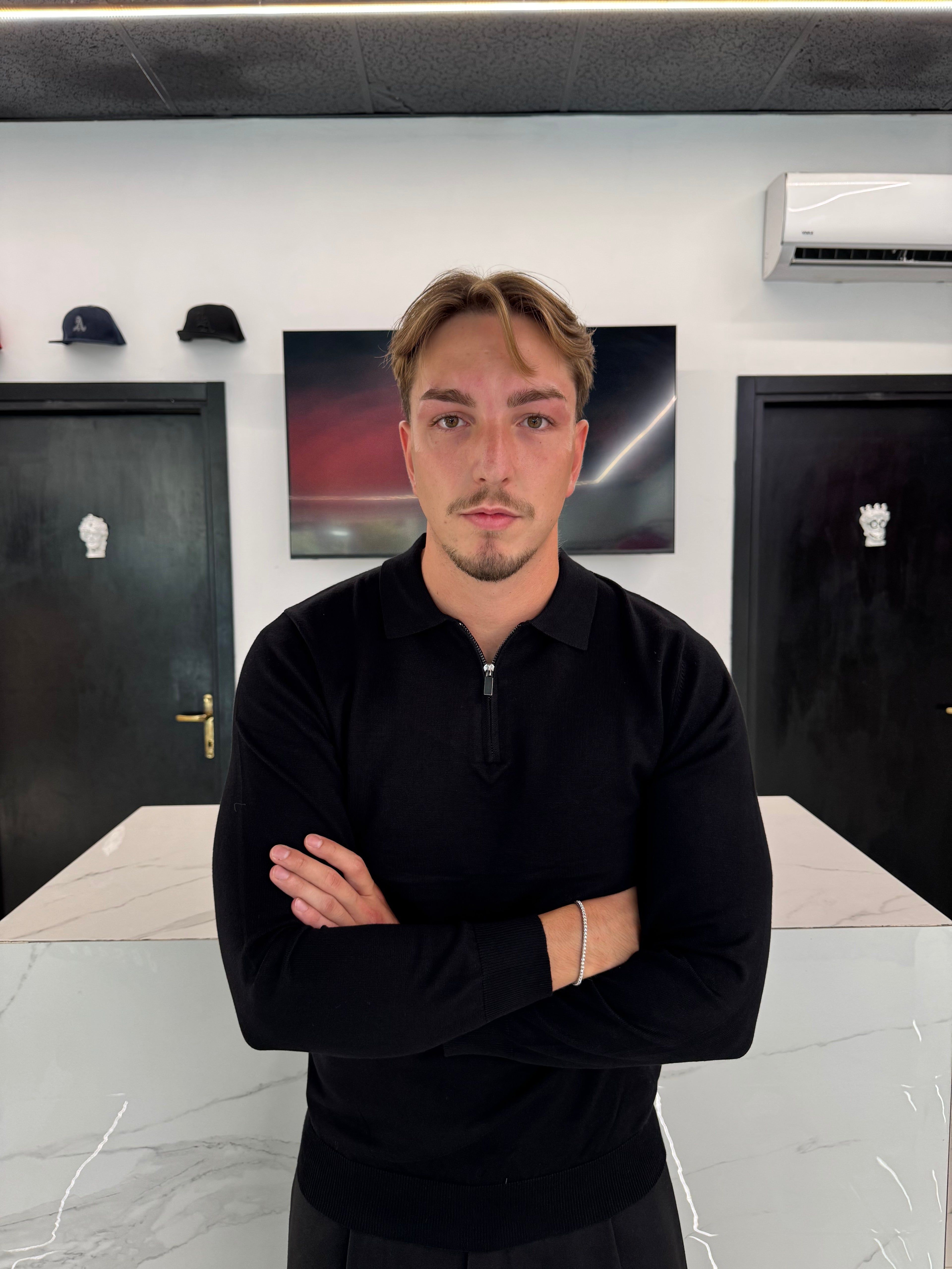 Polo maniche lunghe con zyp nera